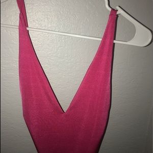 Pink body suit